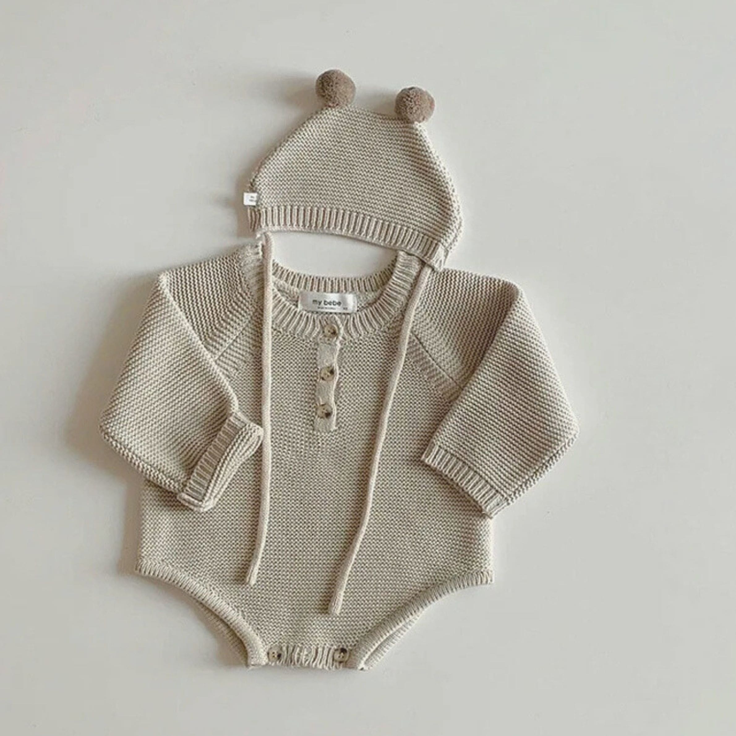 Combinaison bébé en maille avec bonnet