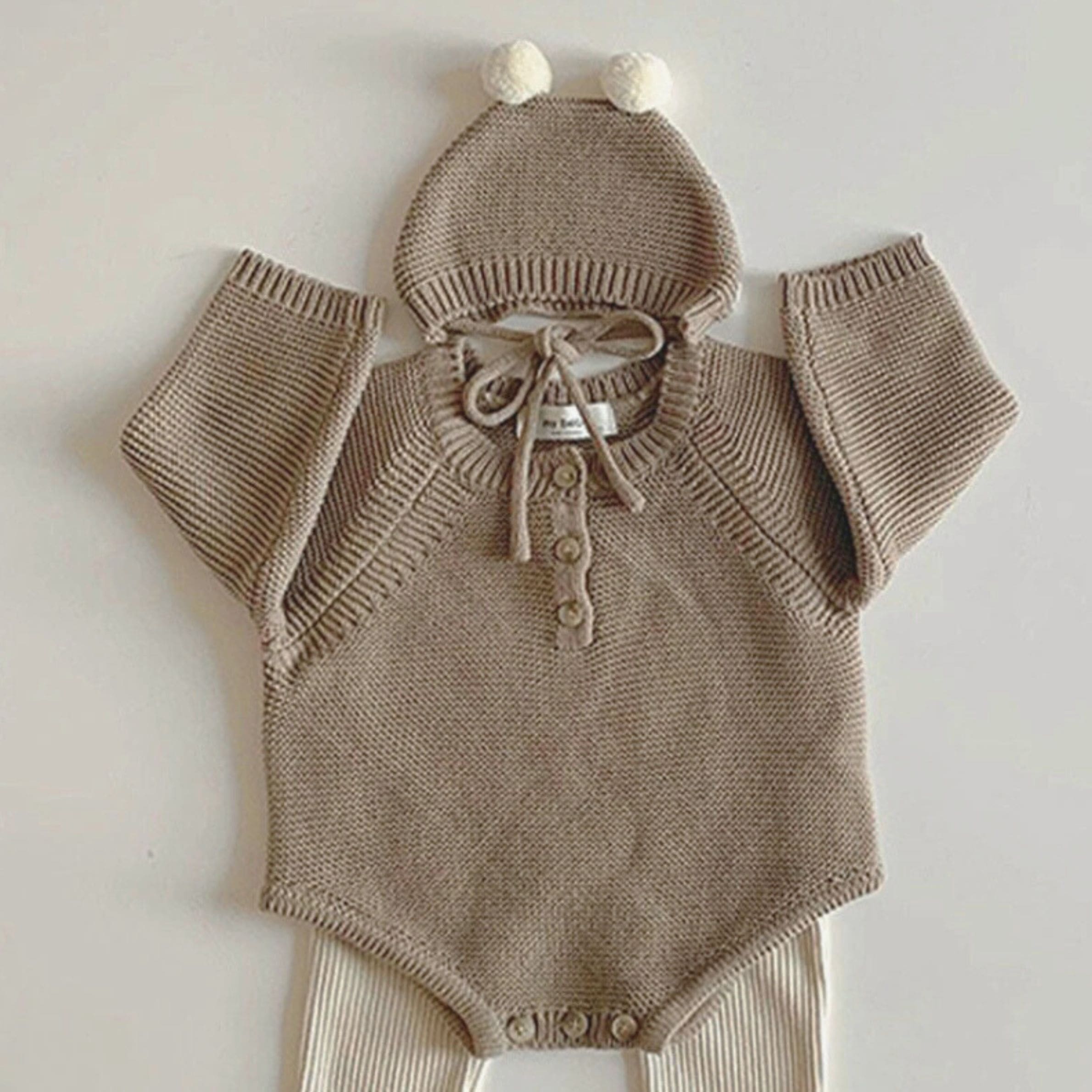 Combinaison bébé en maille avec bonnet