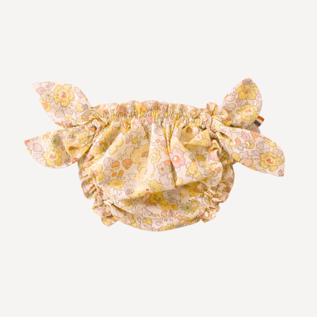Maillot de bain pour bébé à motifs floraux jaunes avec nœuds sur les côtés